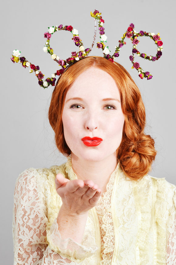 headband with 'LOVE' written in small roses