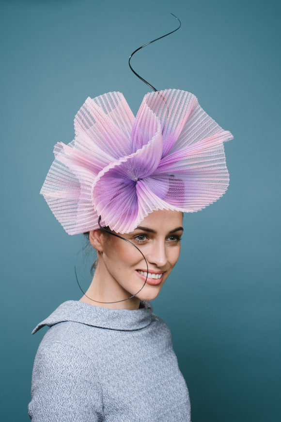 purple crin poofs with navy quills